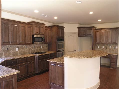 Therefore, in very few houses, you will spot a rustic and natural look of wood used for kitchen cabinets. Modern Walnut Kitchen Cabinets Design Ideas 41 - Decoratoo