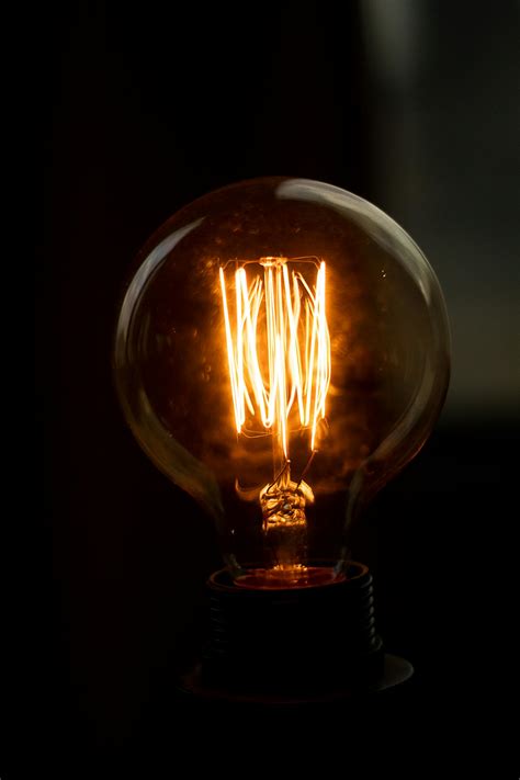Lighted Clear Light Bulb · Free Stock Photo