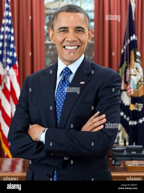 President Barack Obama Poses For An Official Photo In The Oval Office