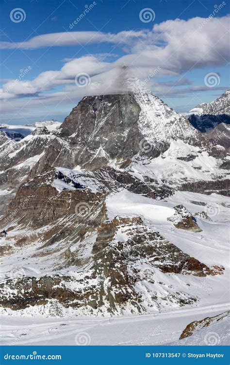 Winter Panorama Of Mount Matterhorn Covered With Clouds Alps