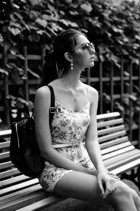 Portrait Of A Babe Woman On A Bench By Stocksy Contributor Yury Goryanoy Stocksy