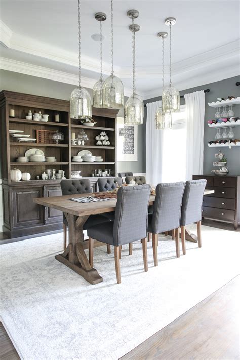 Place a large area rug under the main table to anchor the decor and provide comfort underfoot. Our new dining room rug - Bower Power