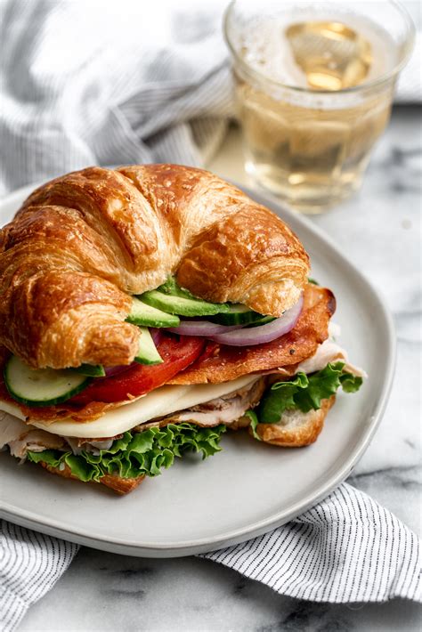Croissant Club Sandwich With Crispy Prosciutto Cooking With Cocktail