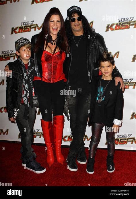 Slash And Perla Hudson With Their Sons 1027 Kiis Fms Jingle Ball Stock