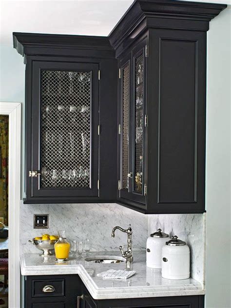 Get free shipping on qualified glass door kitchen cabinets or buy online pick up in store today in the kitchen department. Bold black cabinets fitted with wire mesh door fronts ...