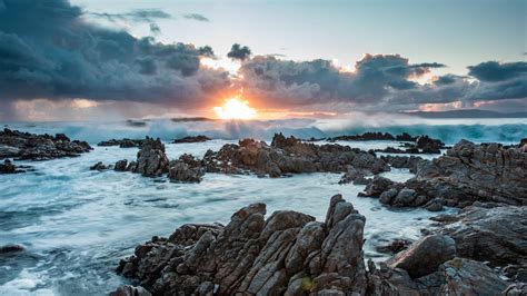 Download Wallpaper 3840x2160 Sunset Rocks Sea Stones Clouds 4k Uhd