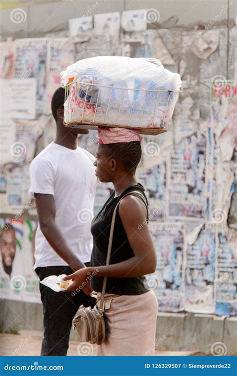 unidentified ghanaian woman carries a basket on her head peopl editorial photography image of