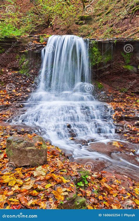 Beautiful Waterfall On A Mountain Stream In The Woods Stock Photo