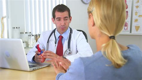 Doctor Answering Patients Questions About Her Heart Hd Stock Footage