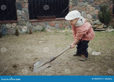 Little Boy Digging A Hole Stock Image Image Of Farmer 58069575