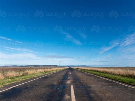Image Of Straight Tarred Road Disappearing Into The Distance Austockphoto
