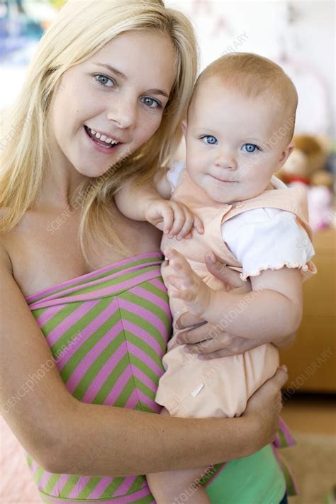 Teenage mother and baby - Stock Image - F001/1916 - Science Photo Library