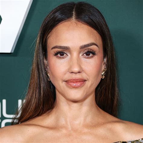 Jessica Alba Shows Off Her Fit Figure In A Gold And Silver Gown For