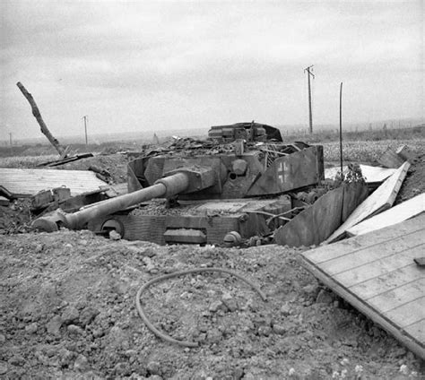 A Knocked Out German Panzer Iv Tank Dug Into A Hull Down Position In