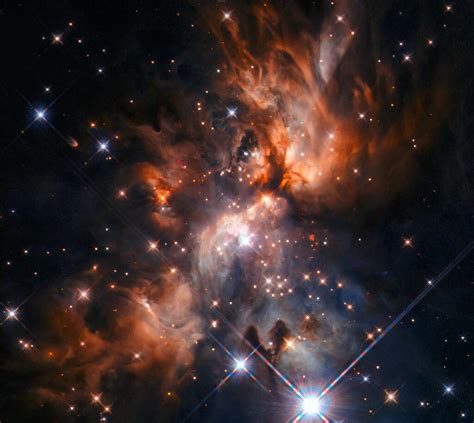 Through The Cosmic Clouds Hubble Spots A Beautiful Stellar Nursery