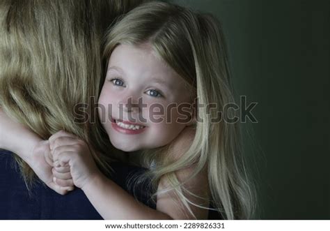 Adorable Little Girl Hugging Her Mother Stock Photo 2289826331