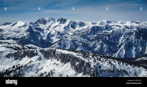 Panoramic View Of Snow Covered Sierra Nevada Mountain Range From The