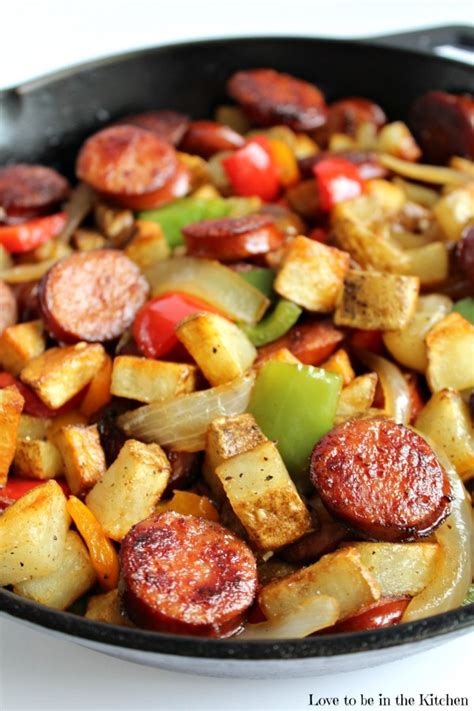 Add the frozen potatoes, ham, and cheese to a large bowl. Smoked Sausage Hash - Love to be in the Kitchen