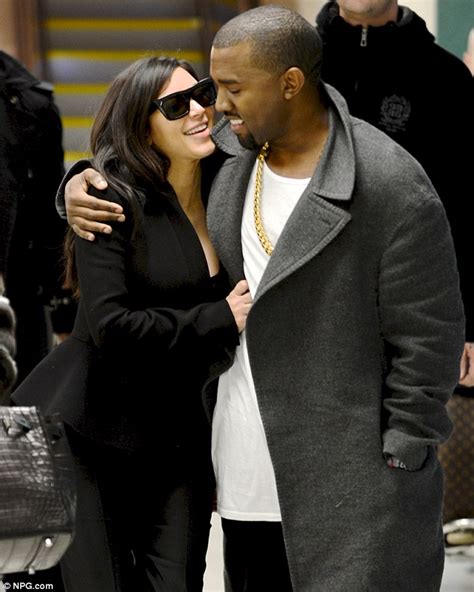 Kim Kardashian Pregnant Kanye West Dotes Over Beaming Baby Mama As