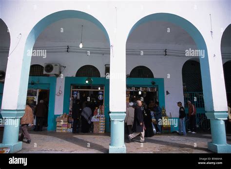 Libya Tripoli People Shopping In Shops Set Behind Arcades Framed With