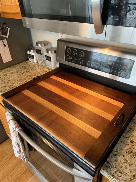 i made a stove top cutting board from walnut and oak : woodworking