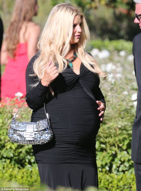 heavily pregnant jessica simpson wears all black for bridesmaid duty for friend s wedding