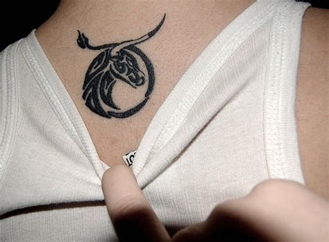 Use your zodiac sign as the basis for your tattoo design. tattoo lovely zodiac taurus with three 3 stars on the ...