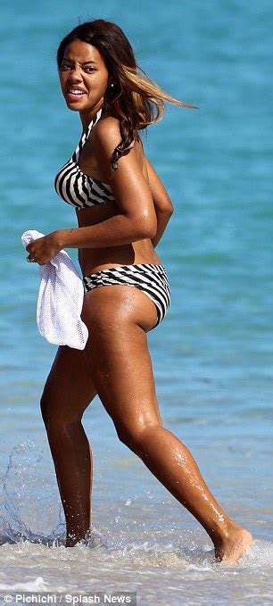 Angela Simmons Pours Curves Into Striped Bikini To Soak Up The Sunshine