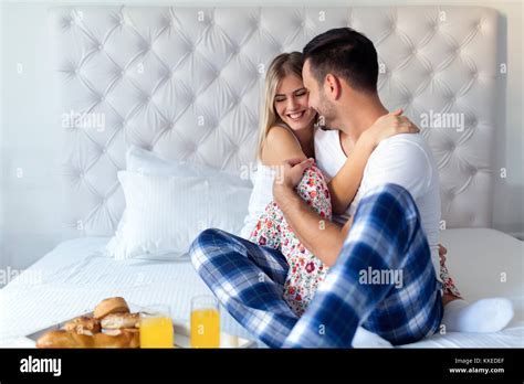 Romantic Couple Kissing In Bed Hi Res Stock Photography And Images Alamy