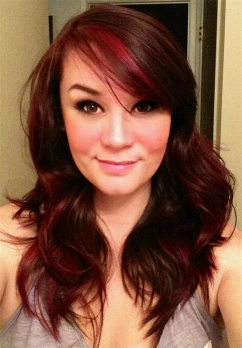 Gorgeous long hair with bangs and a deep auburn red hue make a combination that results in a very chic hairstyle. em this would look nice on you. I love the big chunky red ...