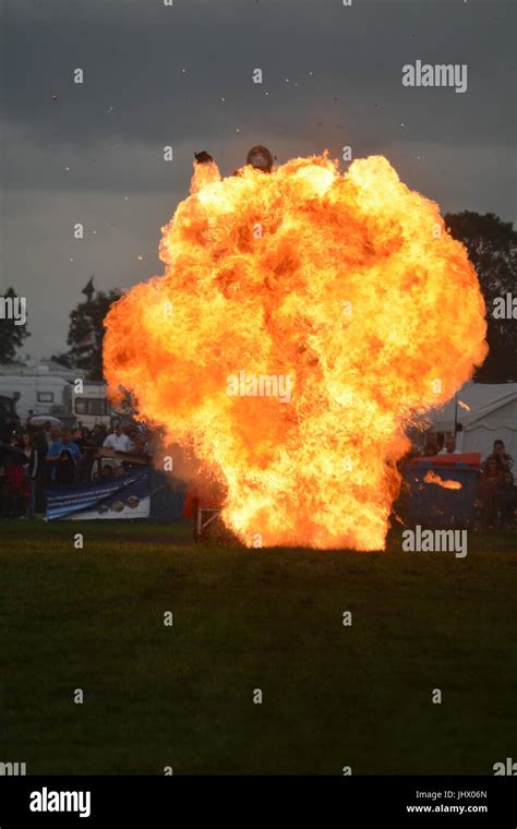Motorcycle Stunt Rider Jumping Through Explosion Flames Stock Photo Alamy