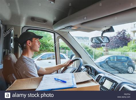 Once it is out of your car it is your responsibility. delivery transportation service job, driver man with package box driving truck car vehicle Stock ...