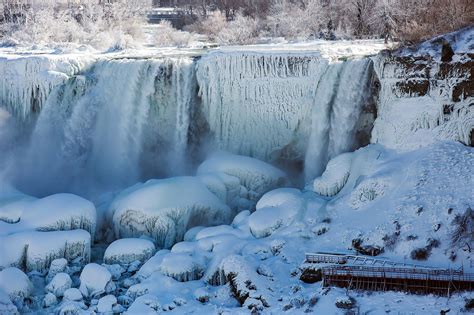 See The Incredible Photos Of Niagara Falls Frozen Over As A Result Of