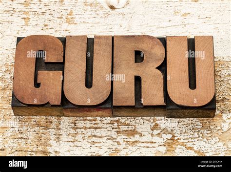 Guru Word In Vintage Letterpress Wood Type Blocks Against Grunge White