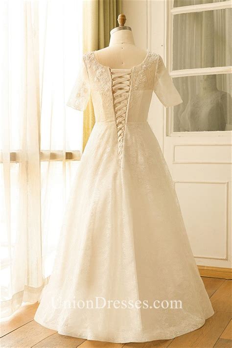 Half sleeve off the shoulder appliques plus size wedding dress. A Line Short Sleeve Corset Back Lace Plus Size Wedding ...