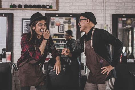 Portrait Of Two Stylist Barber Hairdresser With Apron Standing At Barbershop Stock Image Image