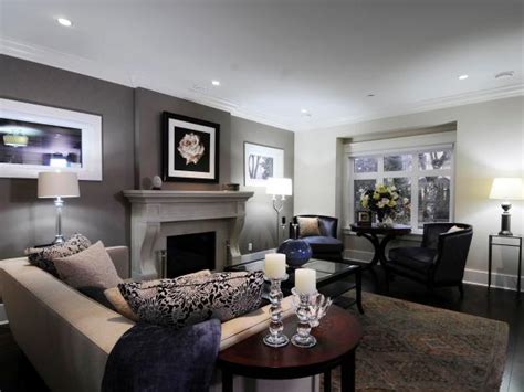 Grey can create a cozy system as conveniently as a trendy one; Gray Transitional Living Room With Fireplace | HGTV
