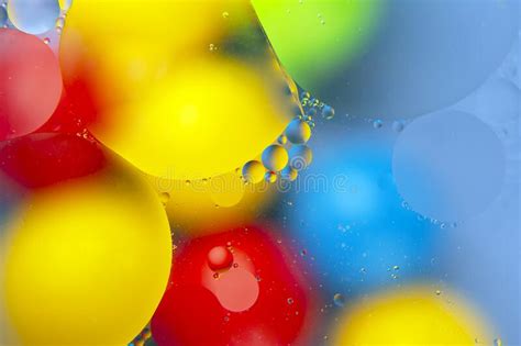 Colored Drops Of Oil Liquid On Glass Abstraction Background Texture