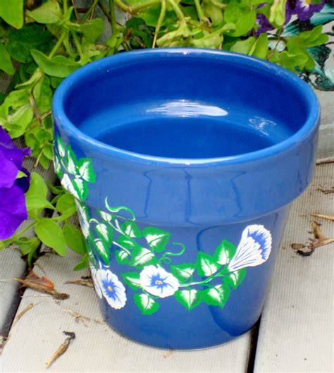 Blue Flower Pot Planter With Blue And White Flowers On Luulla