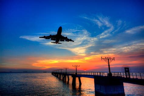 Aeronautical Lights And Airplane Landing At Hong Kong Airport The