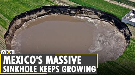 Huge Sinkhole In Mexico Threatens To Swallow House Mexico Giant Hole