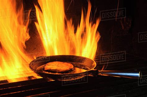 Frying Pan On Open Fire Stock Photo Dissolve