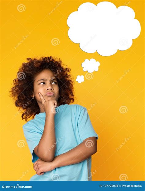 African American Child Girl Thinking With Blank Cloud Stock Photo