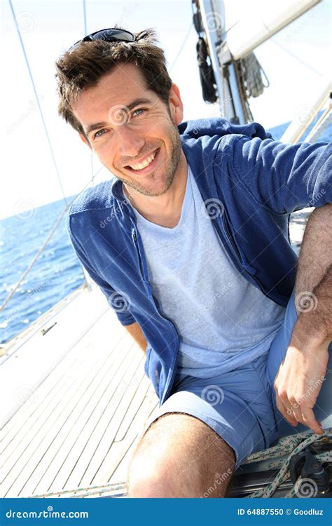 Smiling Handsome Man On A Sailing Boat Stock Photo Image Of Sailor
