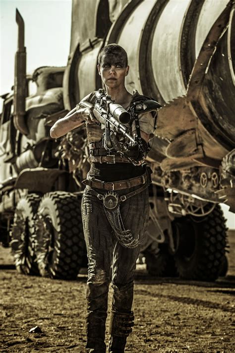 In a stark desert landscape where humanity is broken, two rebels just might be able to restore order: 41 New MAD MAX: FURY ROAD Pictures | The Entertainment Factor
