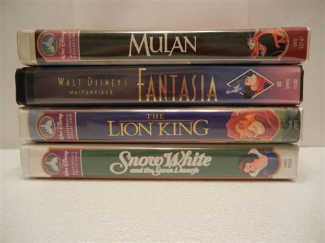 4 DISNEY VHS TAPES MULAN FANTASIA LION KING SNOW WHITE THE SEVEN