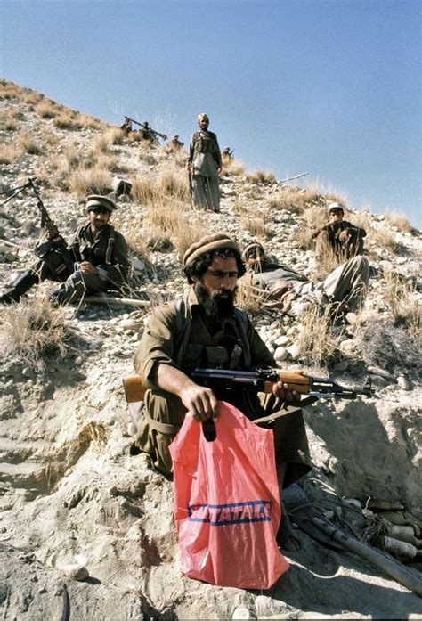 An Afghan Mujahideen Guerrilla Holding A Finnish Grocery Store Bag Somewhere Near Jalalabad