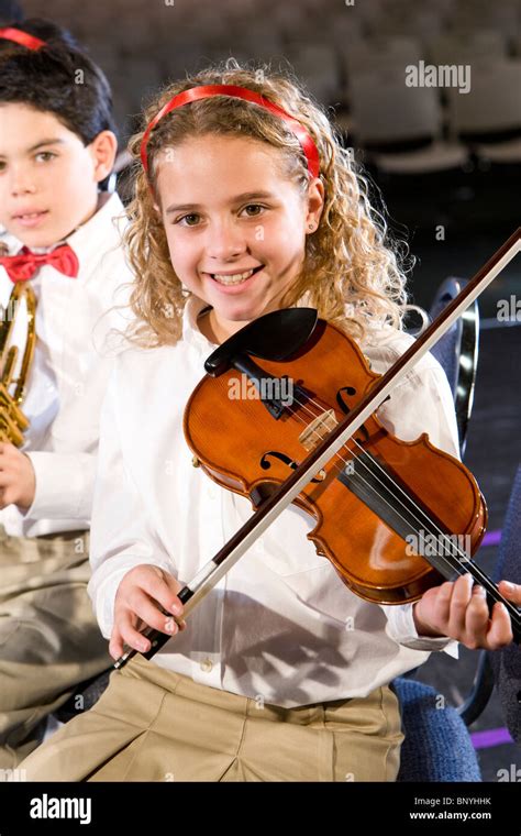 Pupils Playing Musical Instruments In Hi Res Stock Photography And