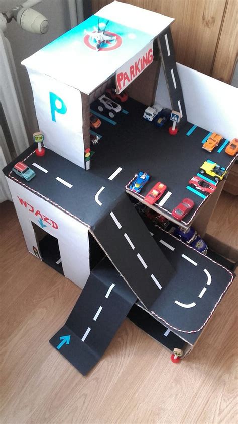 It has a short ramp that little matchbox cars can drive up, and park on top. DIY Parking Lot (Parking Garage) for Kids | Pages From ...