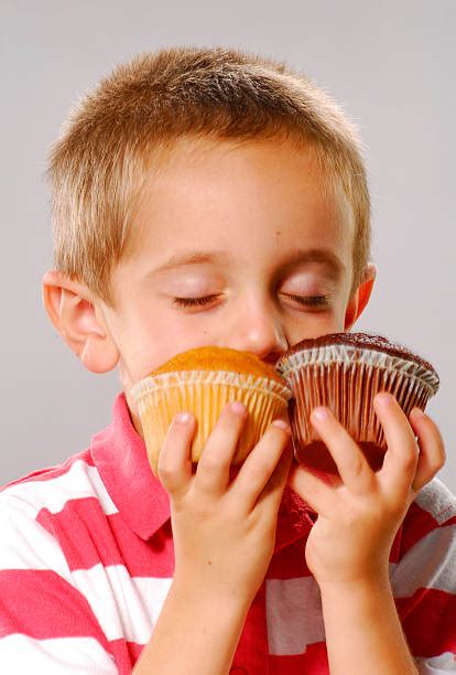 Best Child Smelling Food Stock Photos Pictures And Royalty Free Images